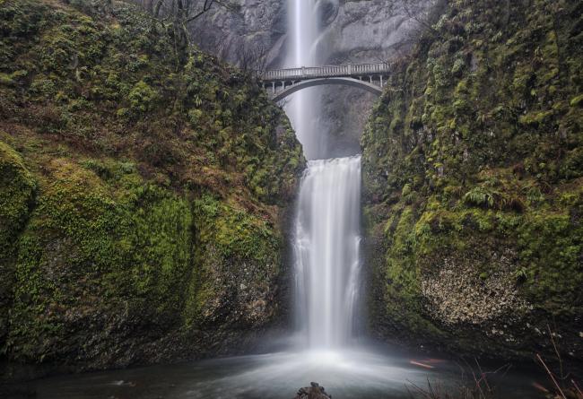 Located a few miles east of Portland, Oregon, Multnomah Falls at 611 feet is the tallest in the Columbia River Gorge. It is a double falls. The lower portion, shown here, is 69 feet high.