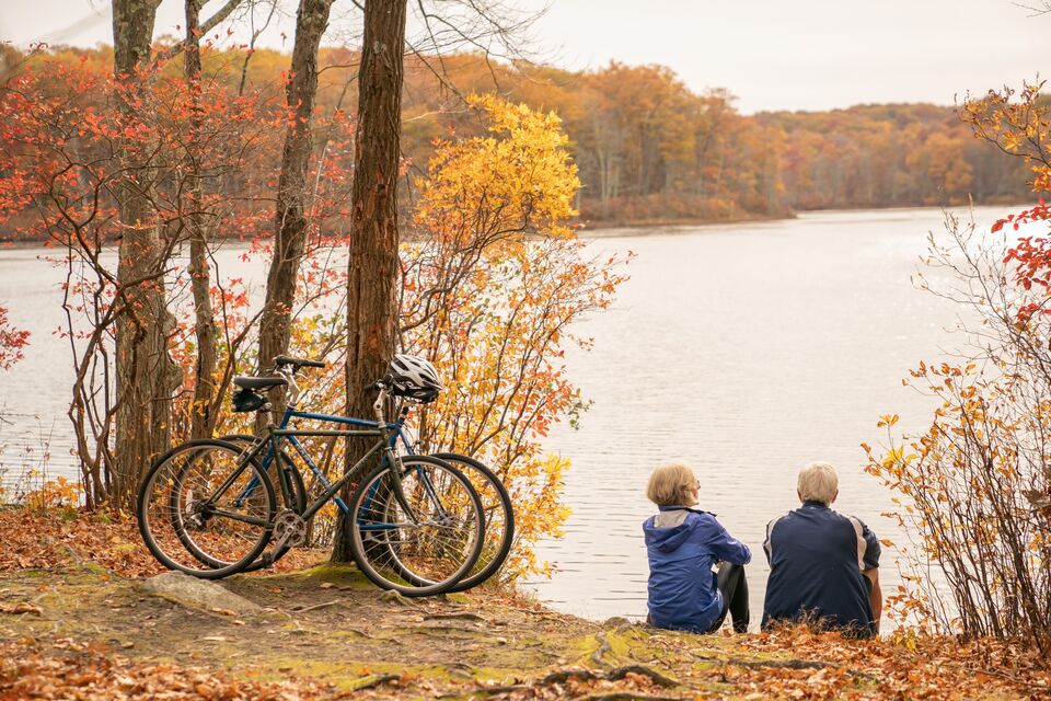 Cyclists enjoy the view at Mono Pond State Park Reserve in Connecticut.