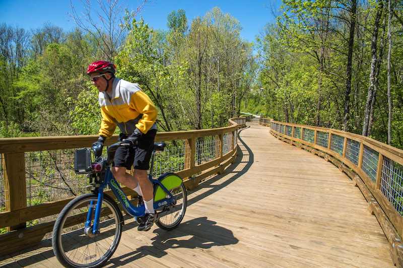 A man bikes the South Chickamauga Greenway