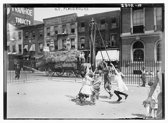 Children in a New York City playground in the early 1900s