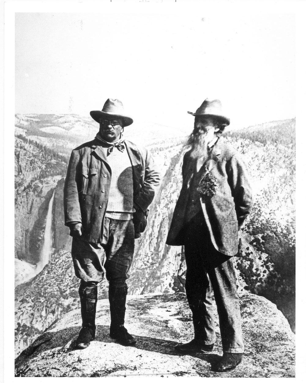 Theodore Roosevelt and John Muir stand together in Yosemite