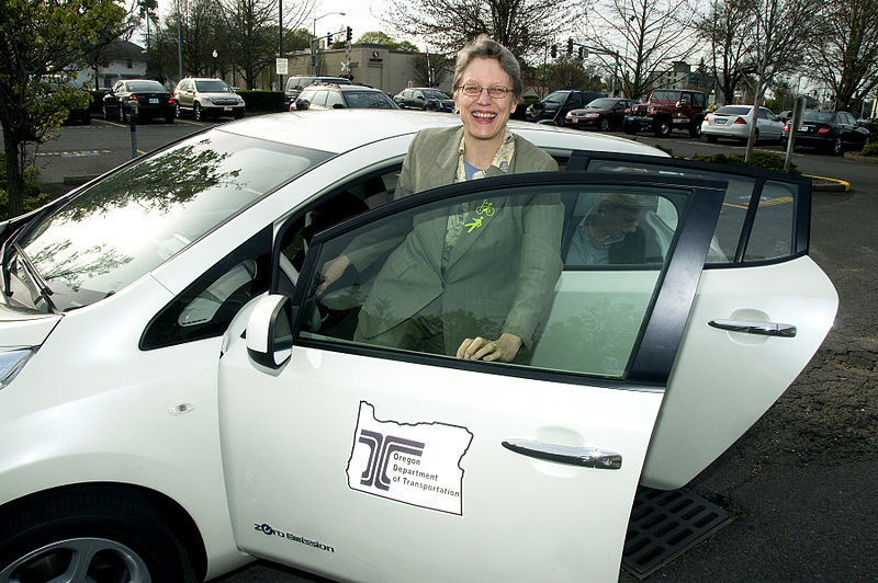 Gail Achterman in an electric vehicle