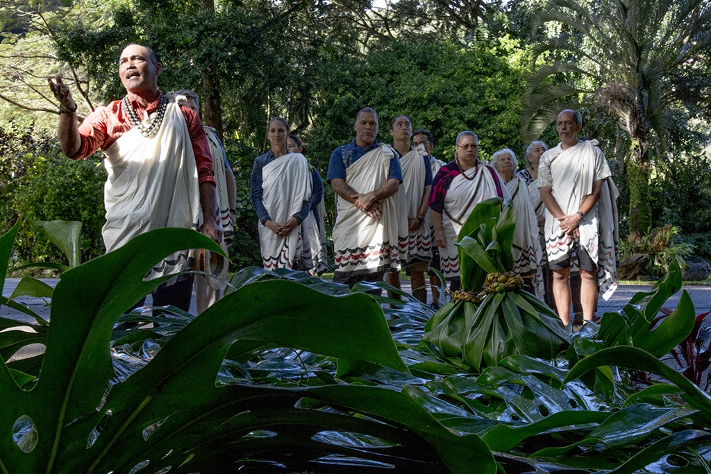 Ceremony participants speak at a blessing for the Puukua property