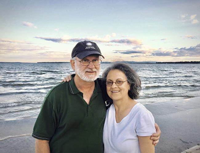 Art and Helen Paxton, standing in front of Lake Champlain in New York, have channeled their appreciation of the outdoors into support for our work.Photo credit: Courtesy of Art and Helen Paxton